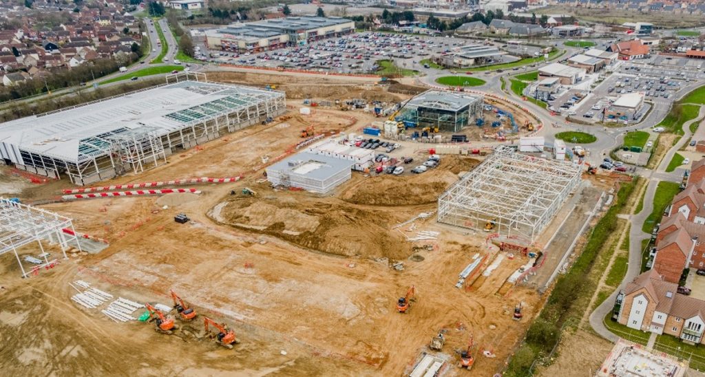 Drone photographs of Stane Retail Park under construction.